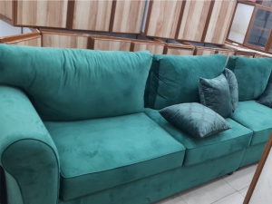 green stylish sofa-أريكة أنيقة خضراء